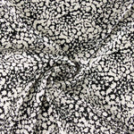 Satin de polyester à imprimé abstrait noir - Ribes y Casals