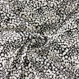 Satin de polyester à imprimé abstrait noir - Ribes y Casals