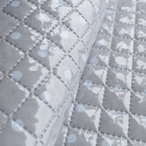 Tissu Matelassé Plastifié à Pois Gris - Ribes y Casals