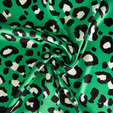 Satin imprimé léopard vert - Ribes y Casals