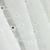 Rideau brodé de fleurs blanches naturelles - Ribes y Casals